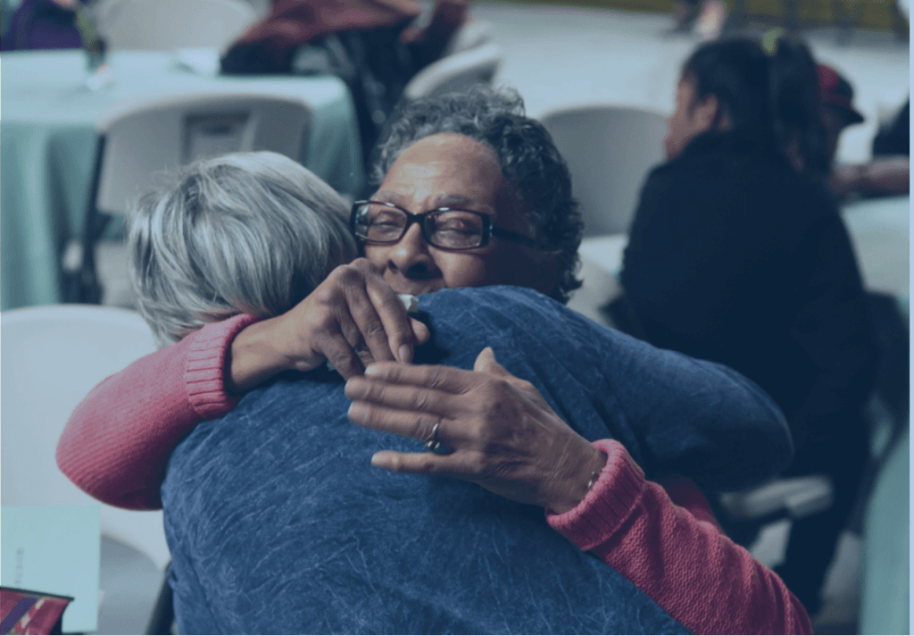 CMC Clients hugging